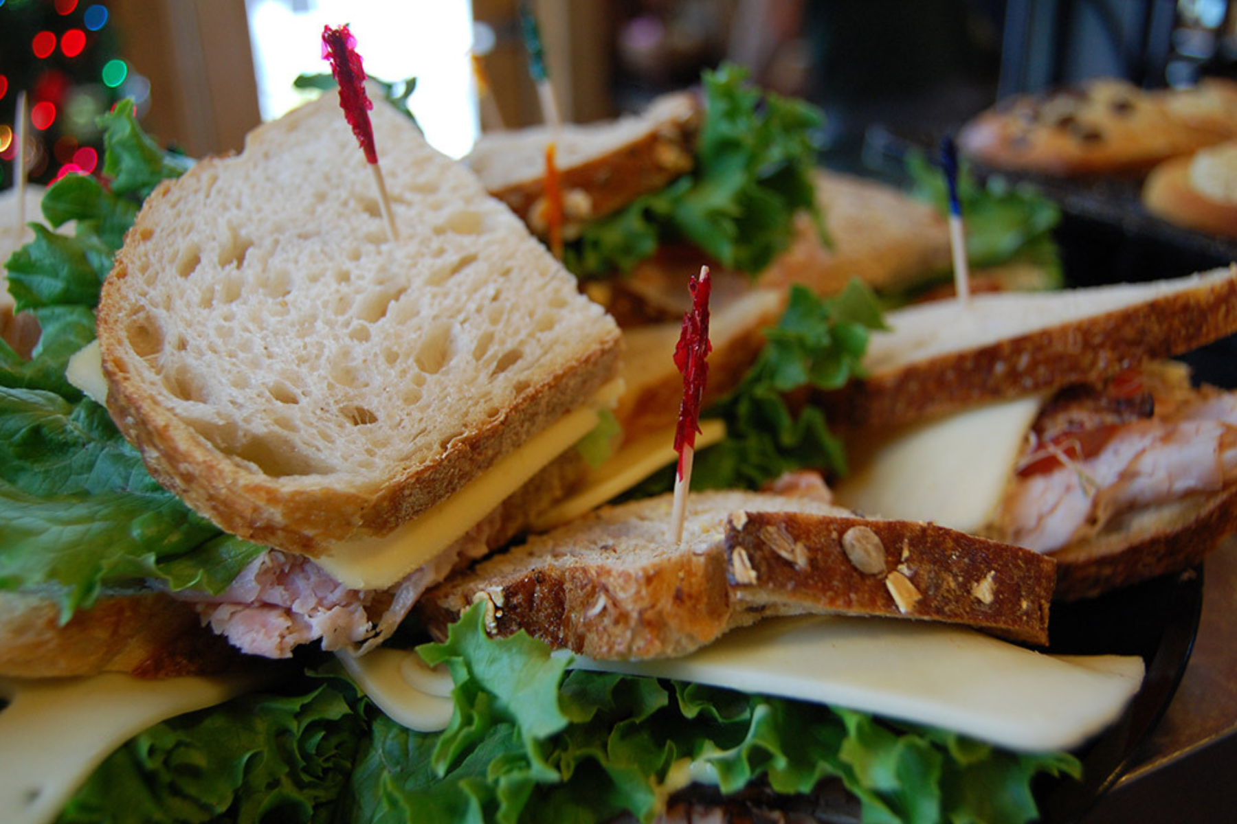 Close-up of turkey and cheese sandwich on whole grain bread served at Darlington Country Club.