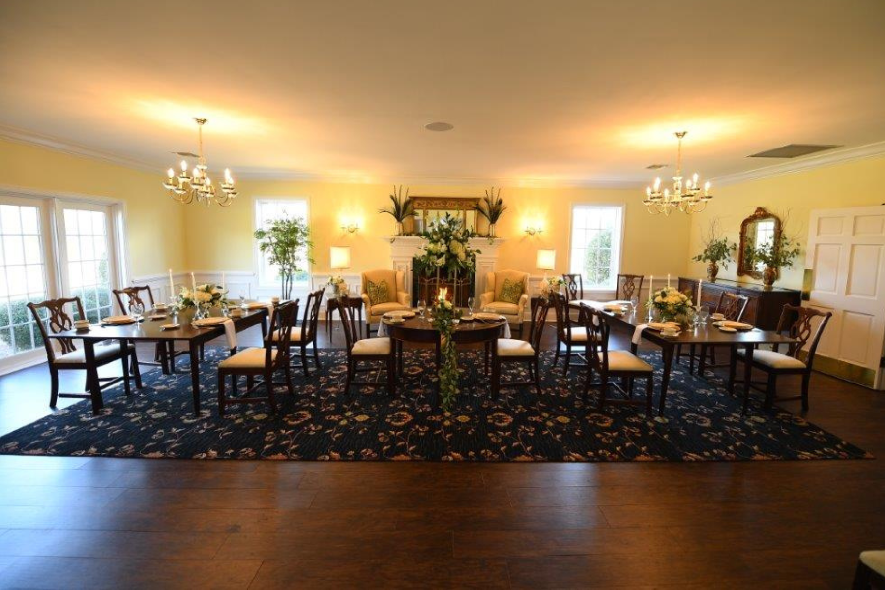The Yellow Room dining area in a luxurious furnished room at Darlington Country Club
