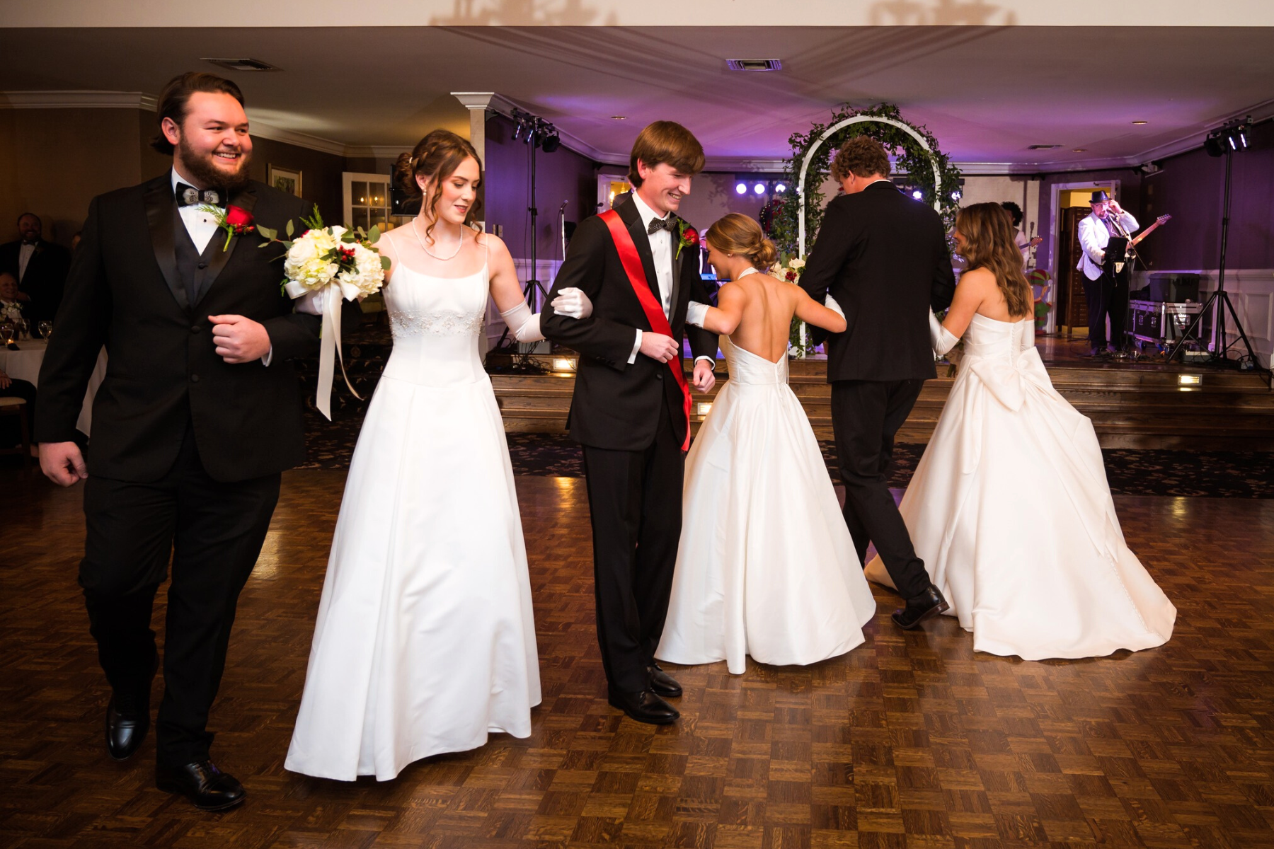 Young men and women dancing in the ballroom at Darlington Country Club