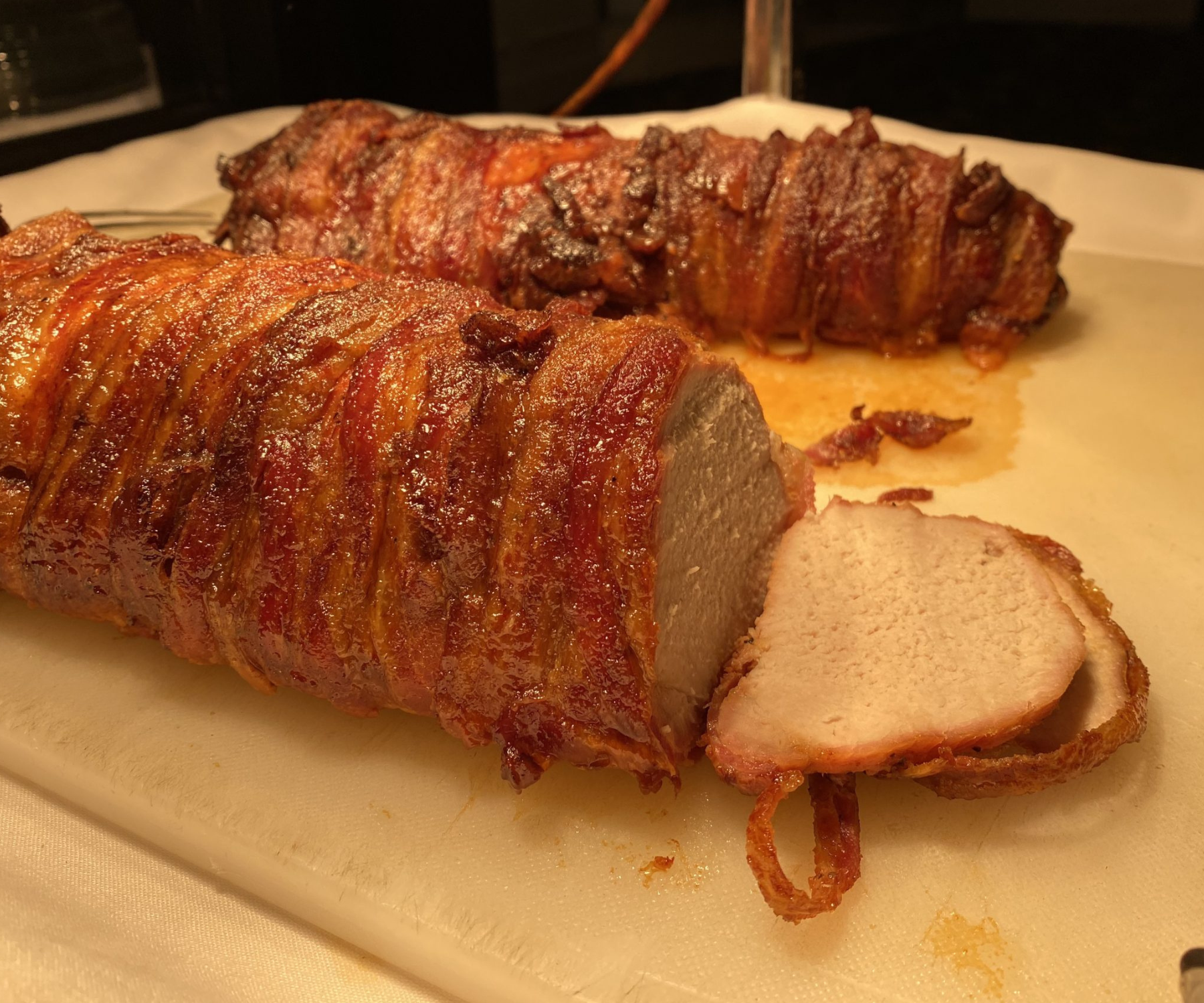 Savory Delight | Darlington Country Club's Bacon-Wrapped Chicken Close-up of a delicious bacon-wrapped chicken dish at Darlington Country Club's dining area