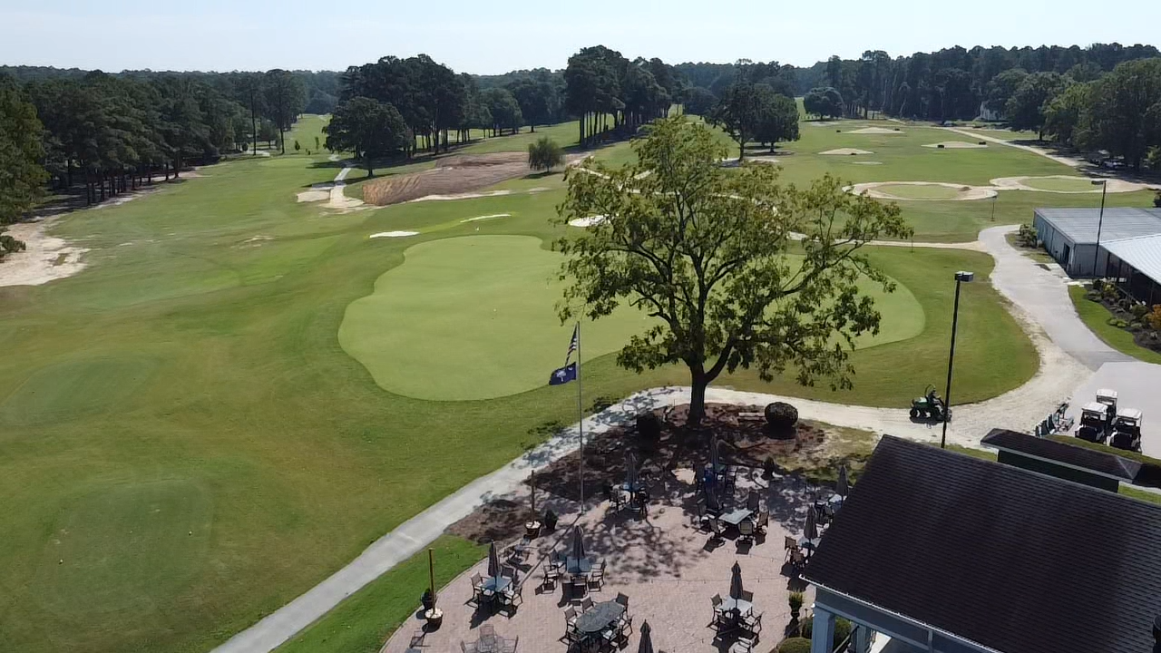 Aerial view of Darlington Country Club golf course with lush green fairways and sand bunkers.