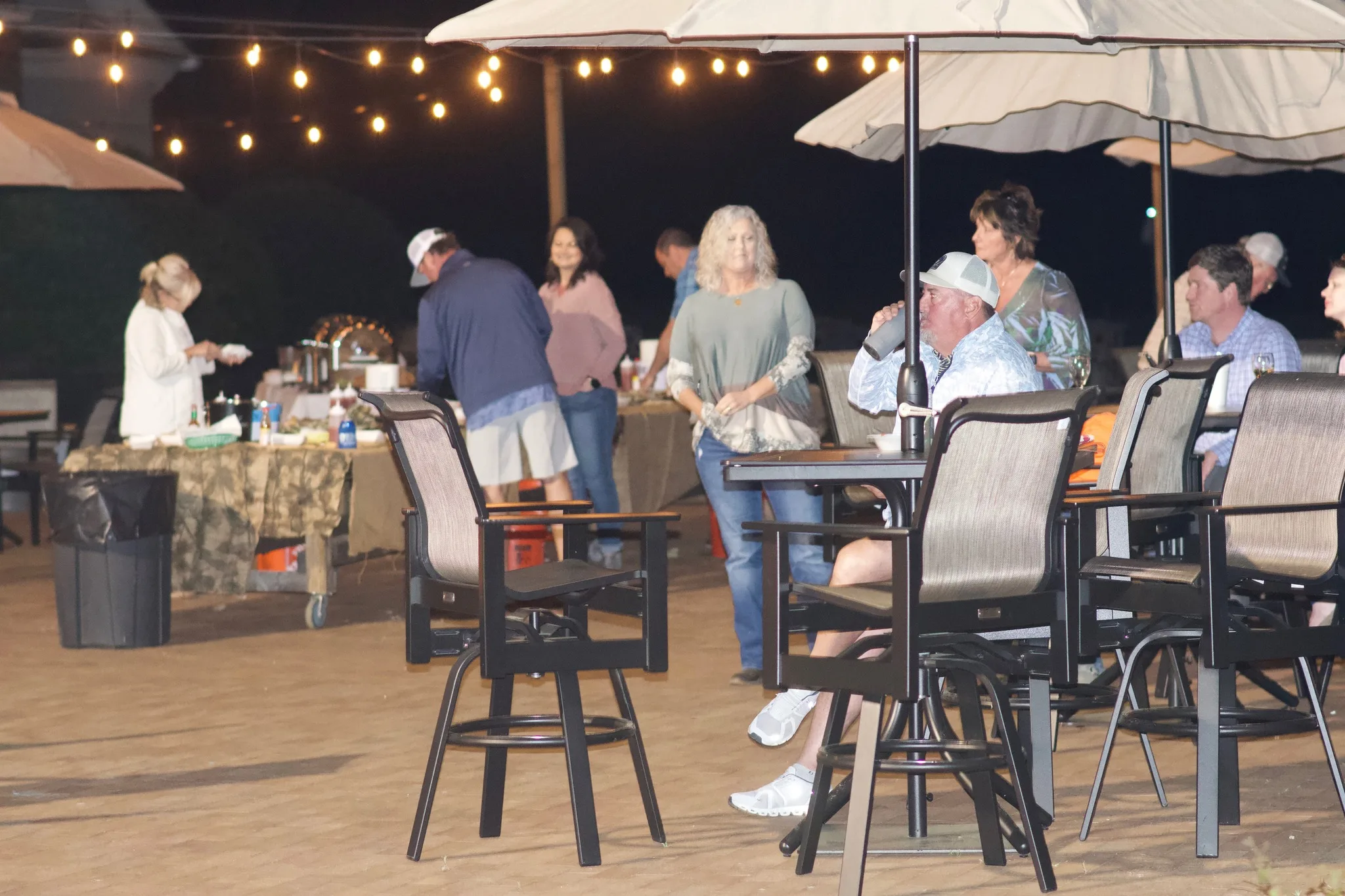 Outdoor dining area at Michael's Porch with guests enjoying a meal